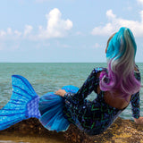 Girl in Mermaid Costume Wearing Turquoise, White & Magenta Ponytail Hair Extensions