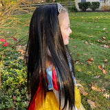 Little girl wearing black princess tiara wig & costume