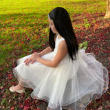 Girls straight black wig with tiara headband  side view