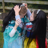 Girls dress-up wearing black princess wig with tiara