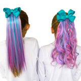 girls wearing straight and wavy pink and teal hair extensions